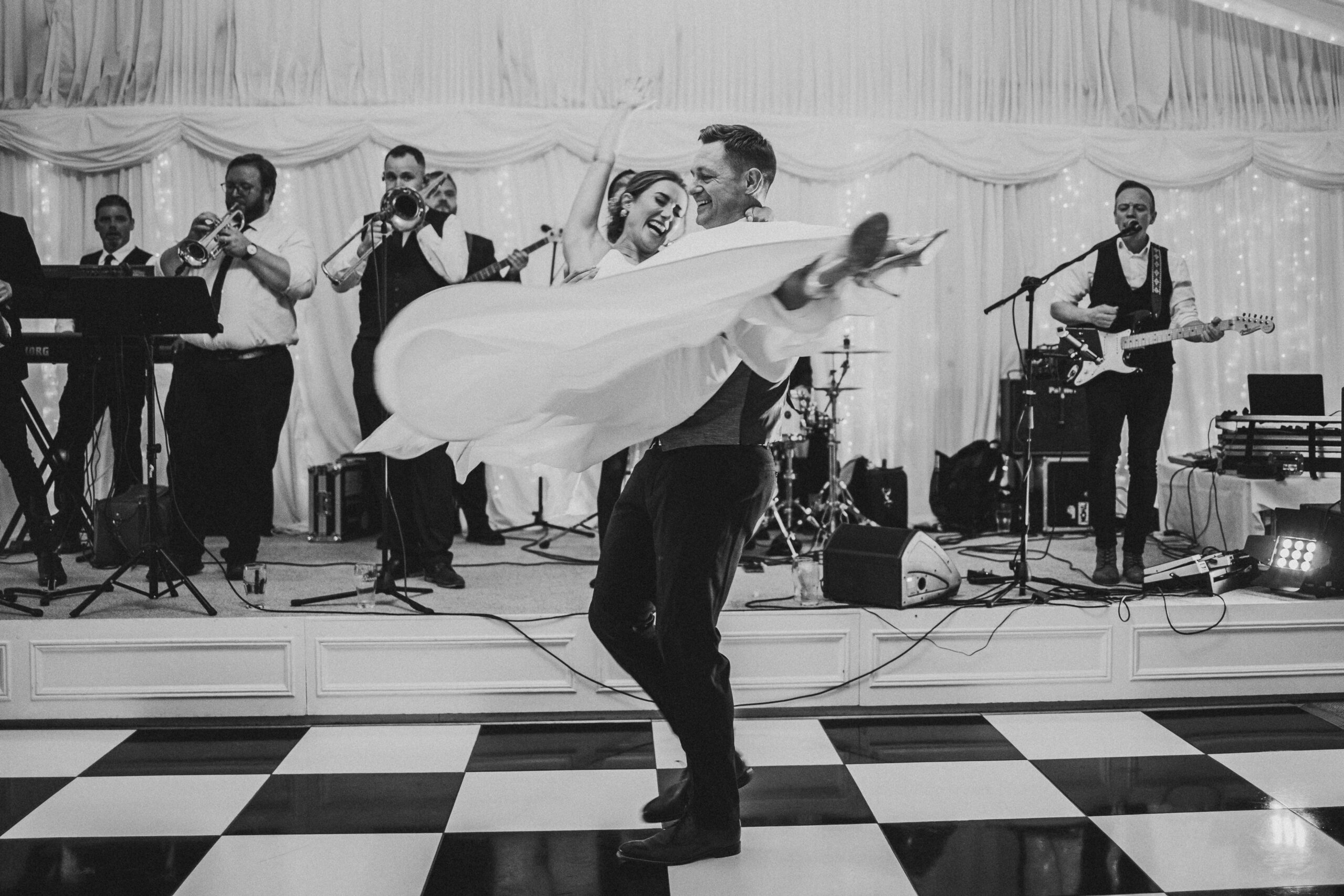 A video still of a bride and groom dancing on the dance floor at Clonabreany